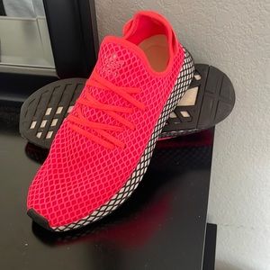 Orange Adidas Women’s sneakers